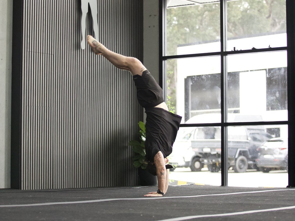 Athlete inverted mid handspring