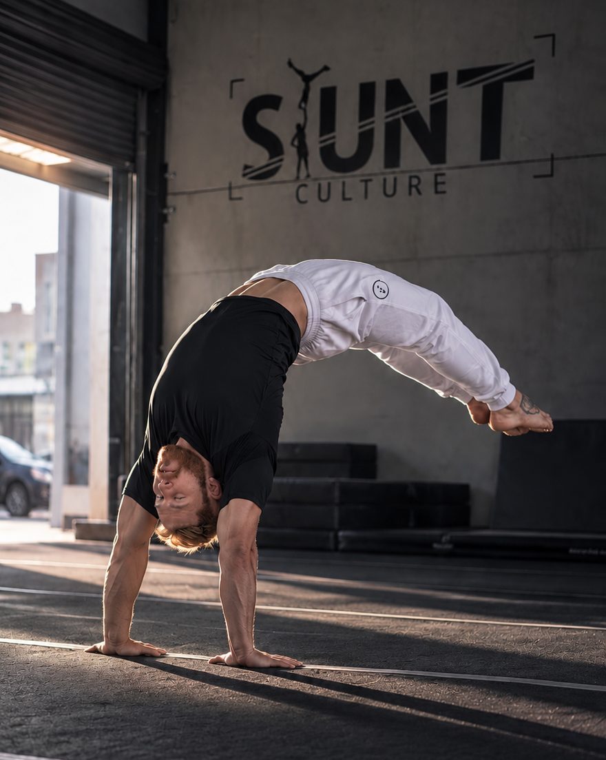 Athlete mid back walkover